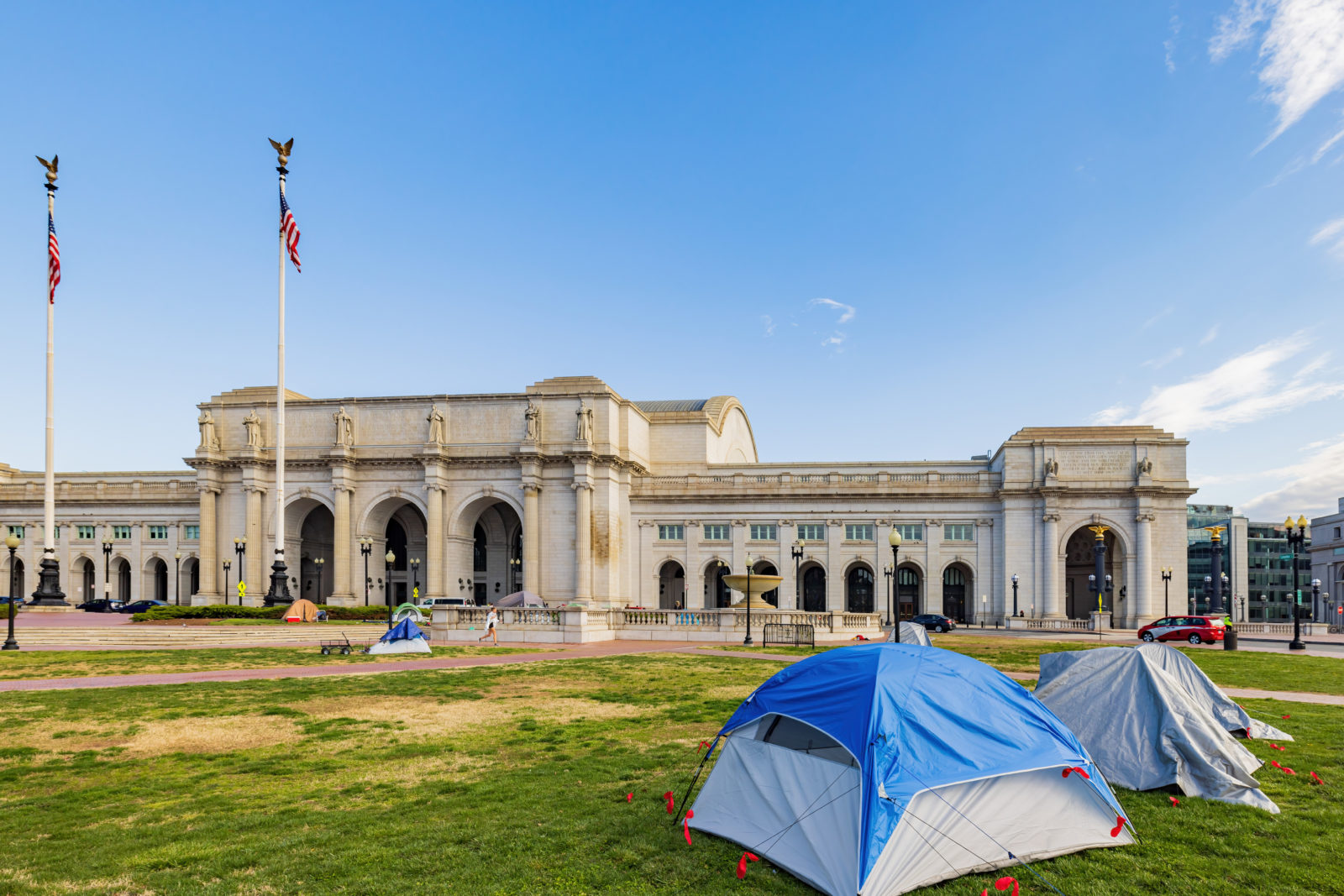 Sunny view of some homeless tent in front of the Union Station