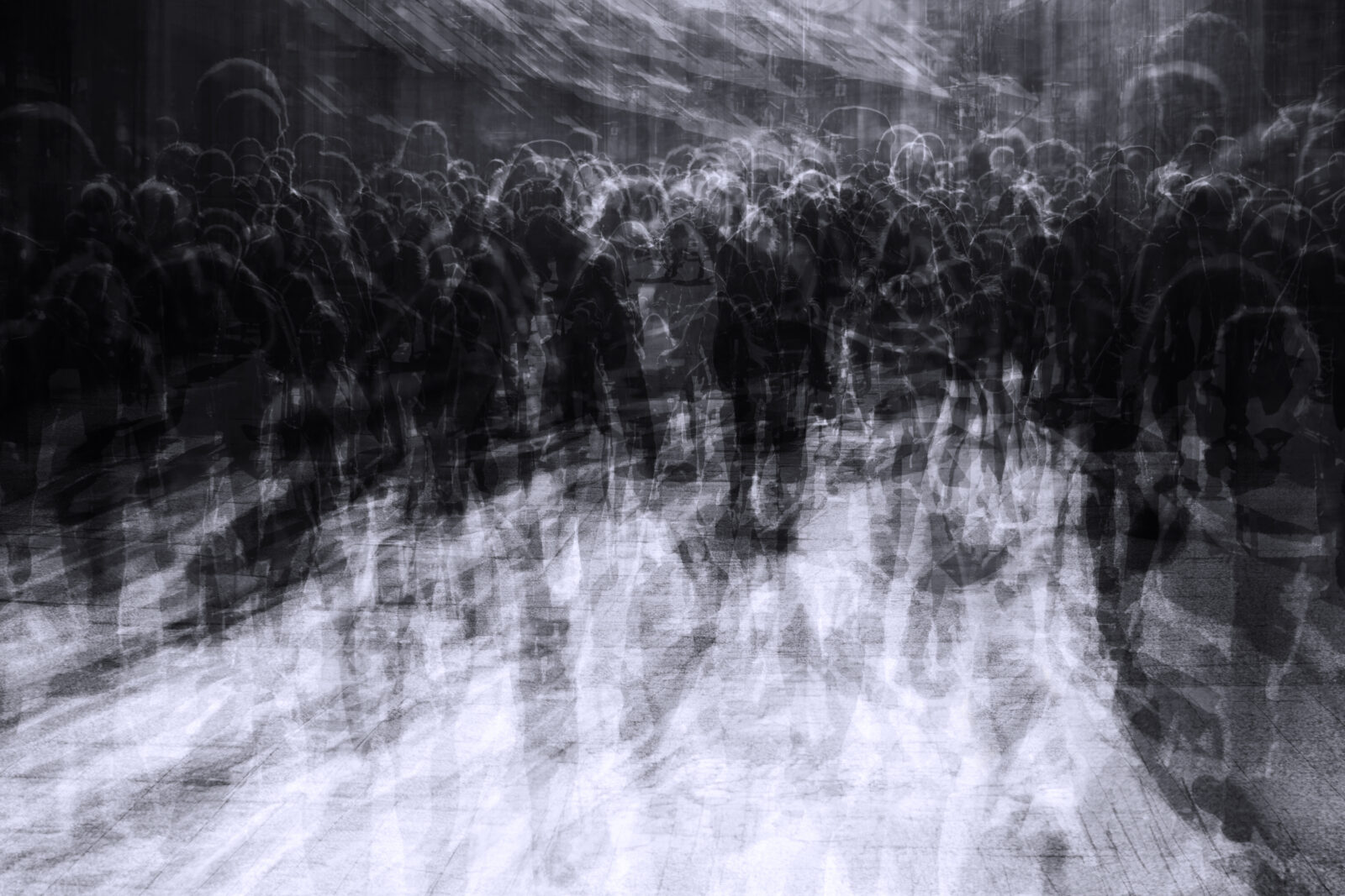 multiple exposure of people in overcrowded city resembling a zombie apocalypse