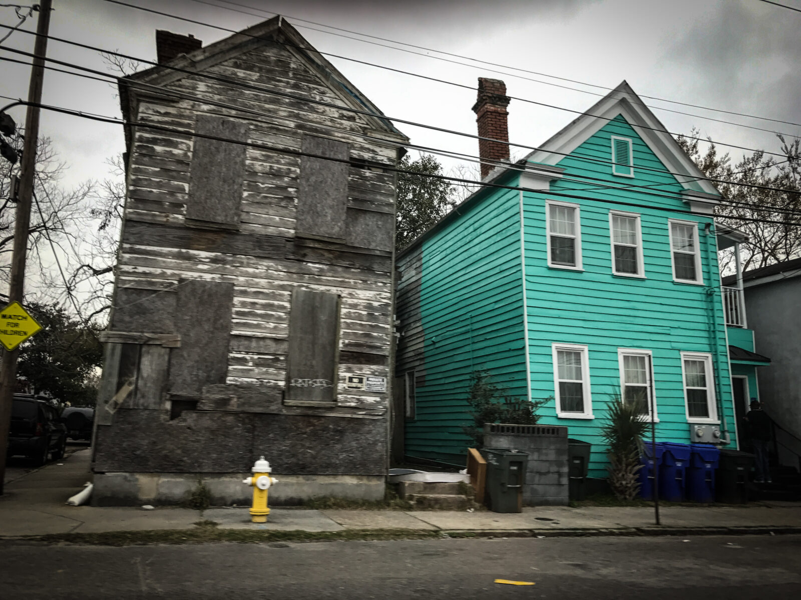 turquoise house and boarded house