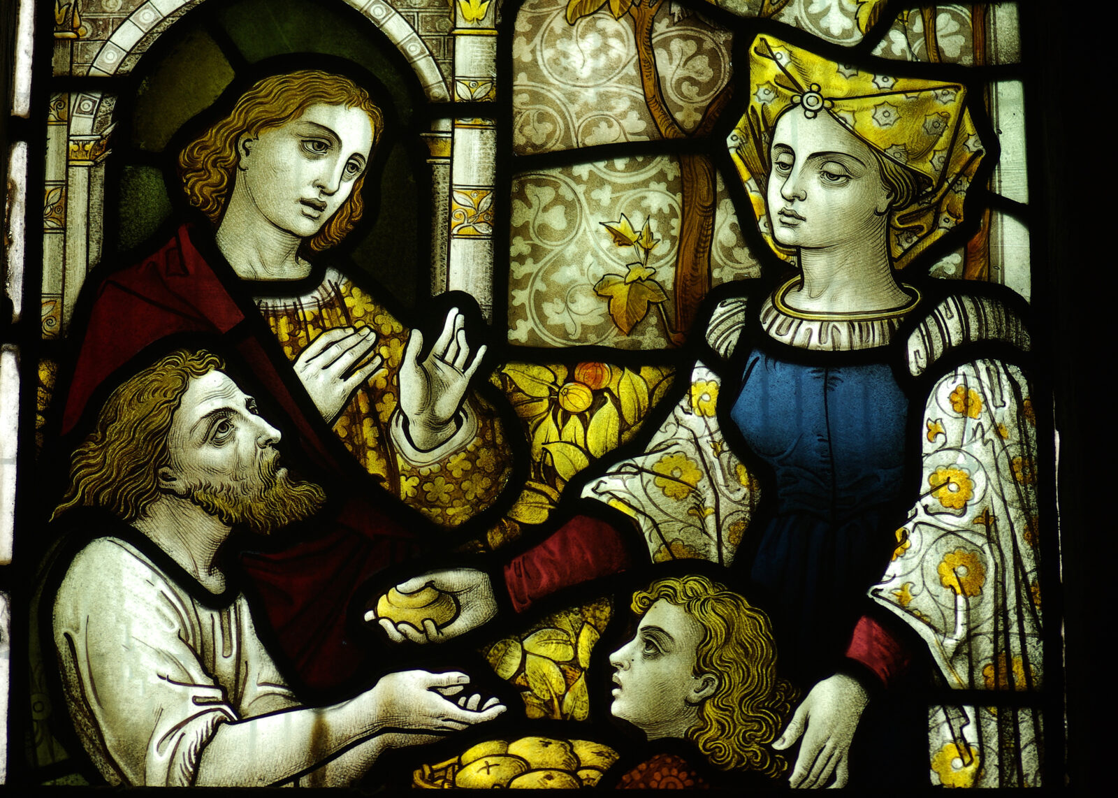 Feeding the poor in stained glass